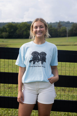 Girl wearing "love has four paws" Labrador T-Shirt 